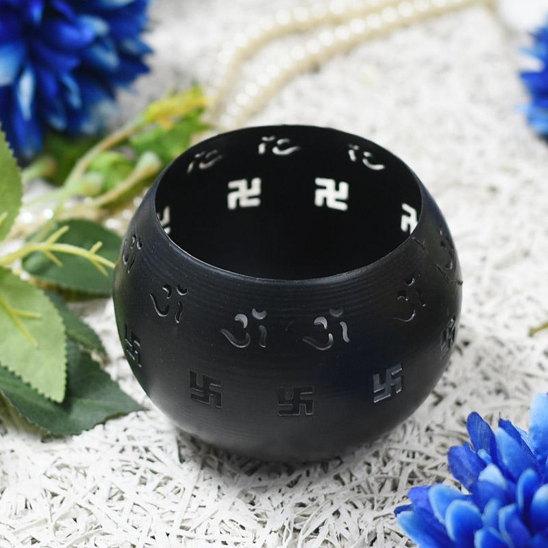 Round Black Decorative Candle Holder with Swastik Motifs
