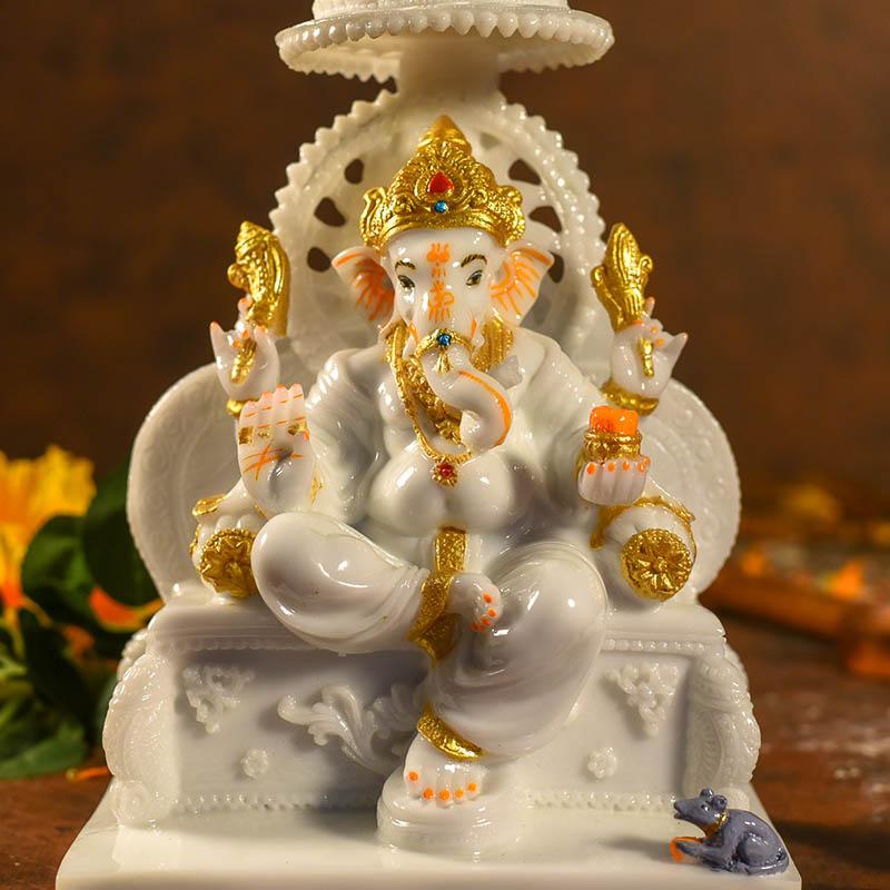 Divine Lord Ganesha On Singhasan Statue