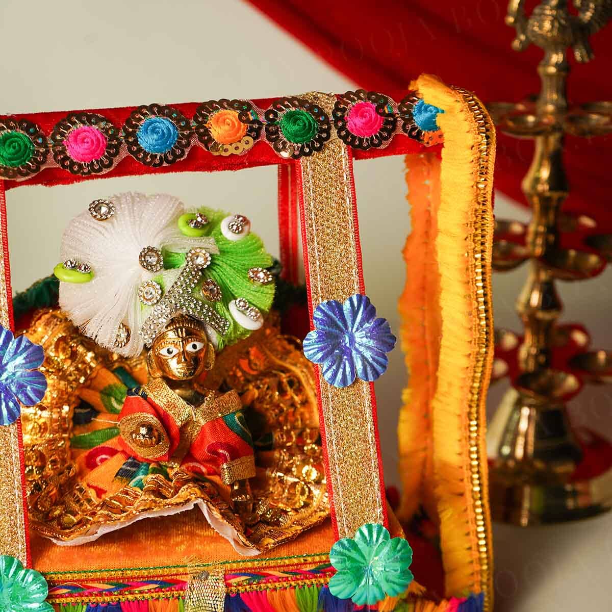 Elegant Red and Gold Krishan Jhula