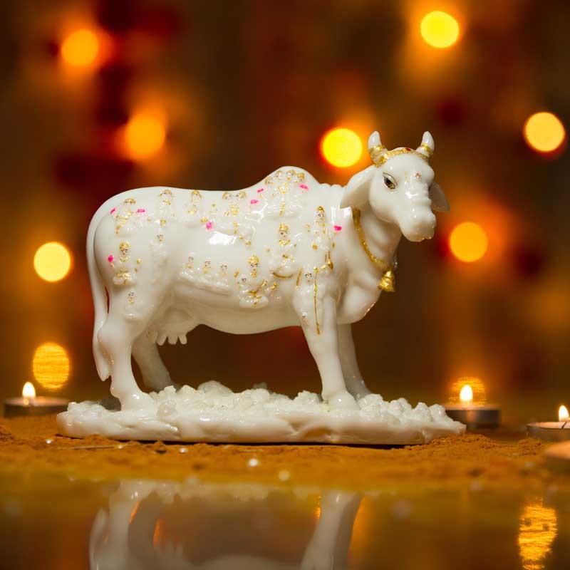 Kamdhenu Cow with God Figurines