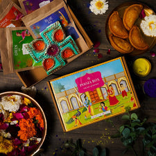 Swastik Diyas & 4 Herbal Gulaal Holi Gift Box (400gms)