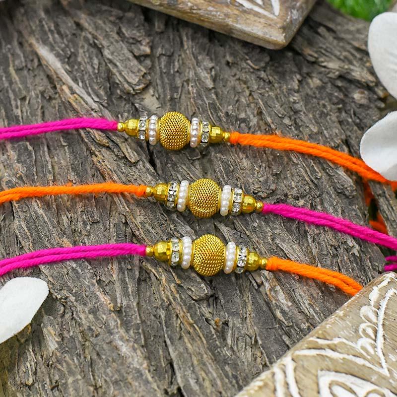 Modern Chic Golden Rakhi Set of 3