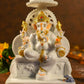Divine Lord Ganesha On Singhasan Statue