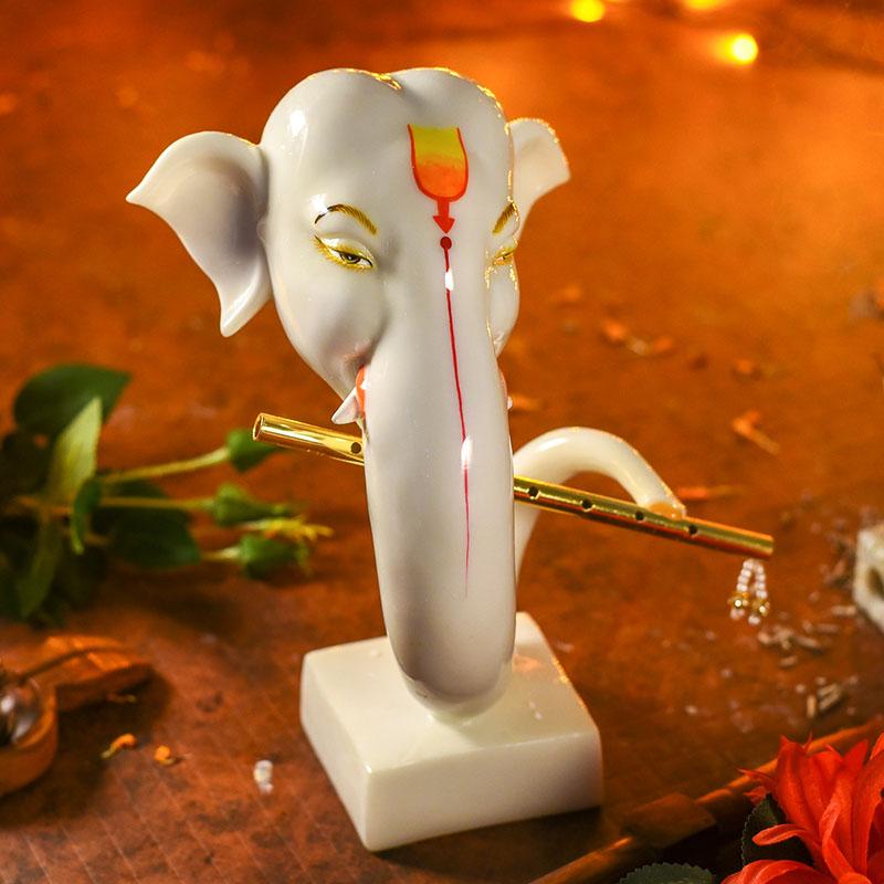 Divine Ganesha Head with Flute