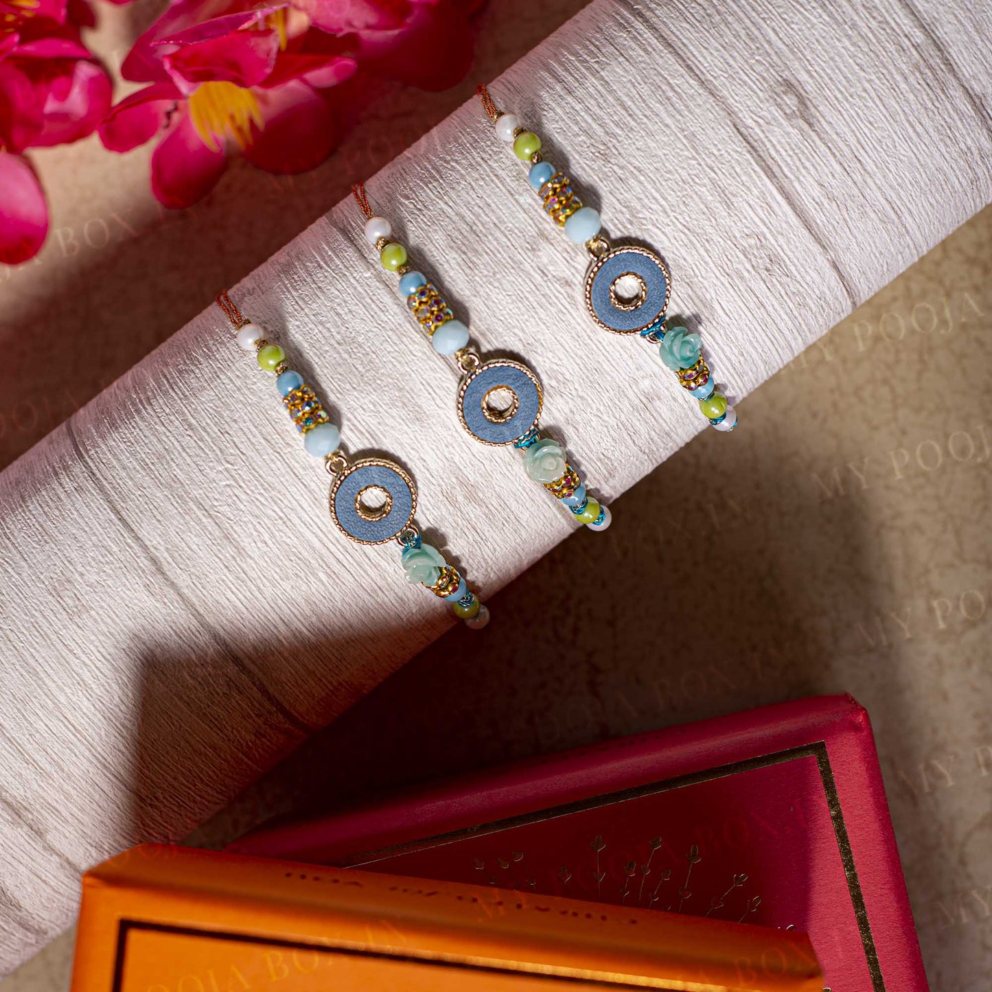 Fancy Golden Ring & Flower Bead Rakhi