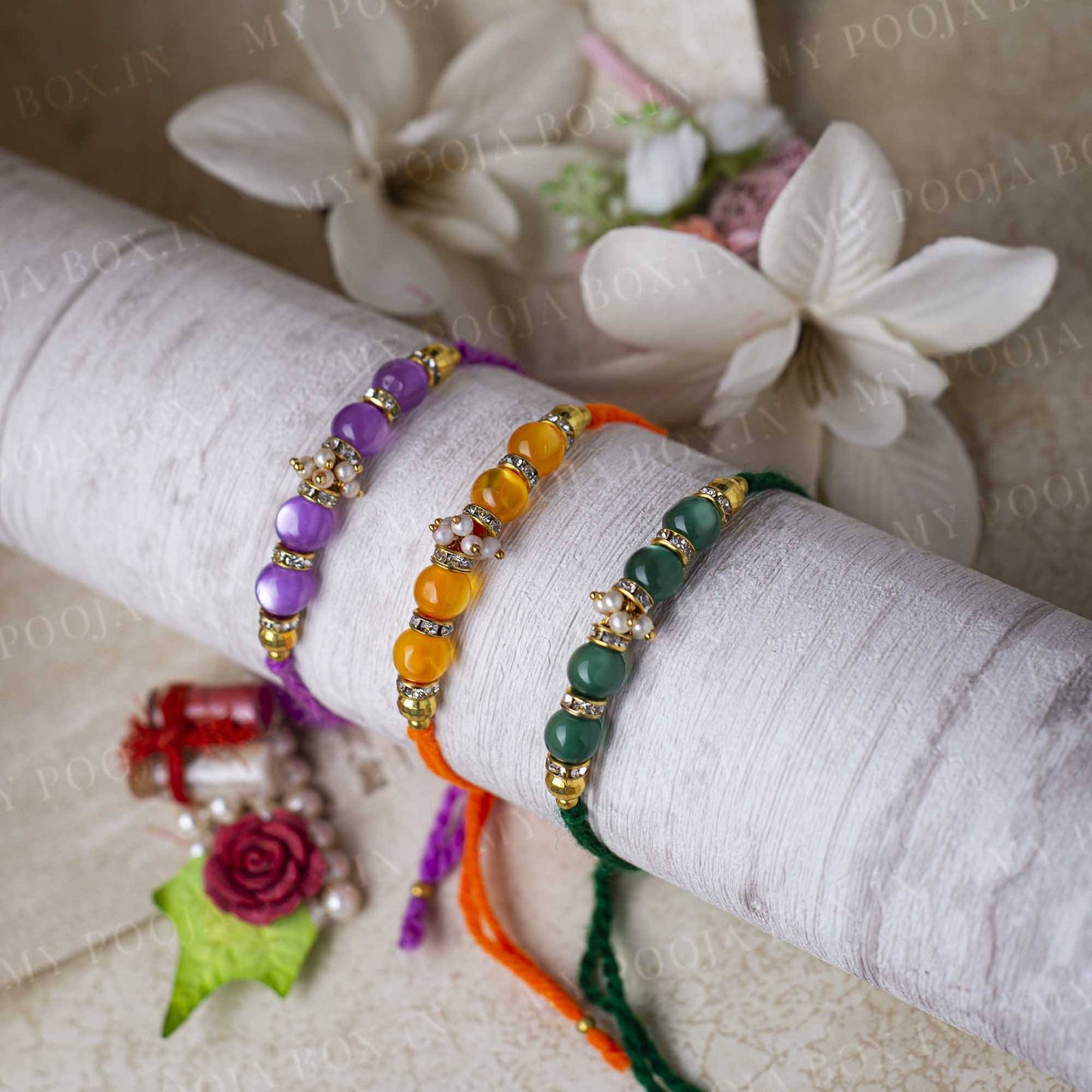 Lilac, Orange & Green Rakhi (Set of 3)