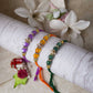 Lilac, Orange & Green Rakhi (Set of 3)