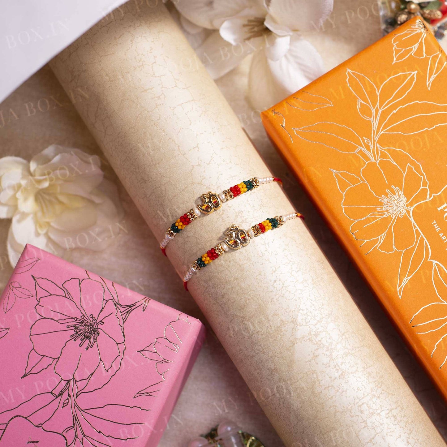 Multi-Colored Om Rakhi (Set of 2)