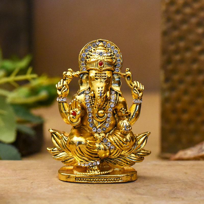 Golden Lord Ganesha Statue On Lotus