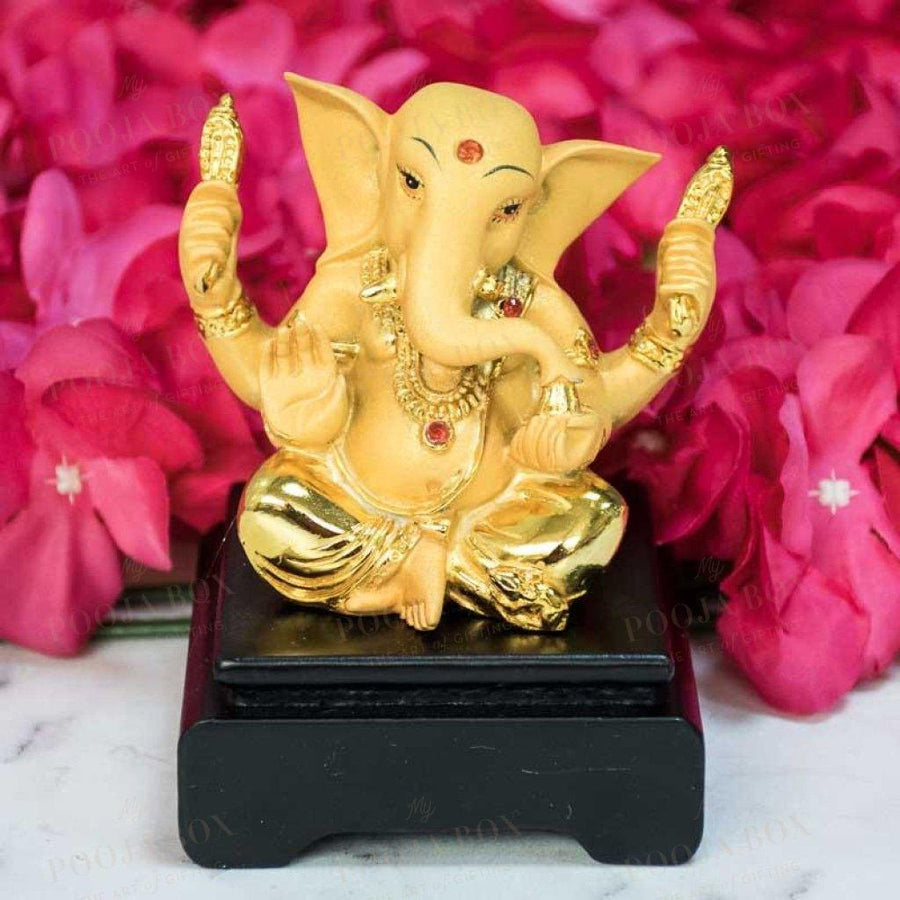 Designer Lord Ganesha Statue On A Wooden Chowki Idols