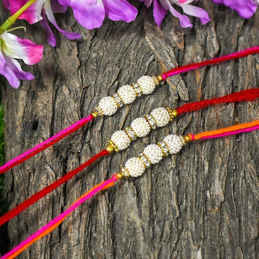 Suave Handcrafted White Beaded Rakhi (Set Of 3)