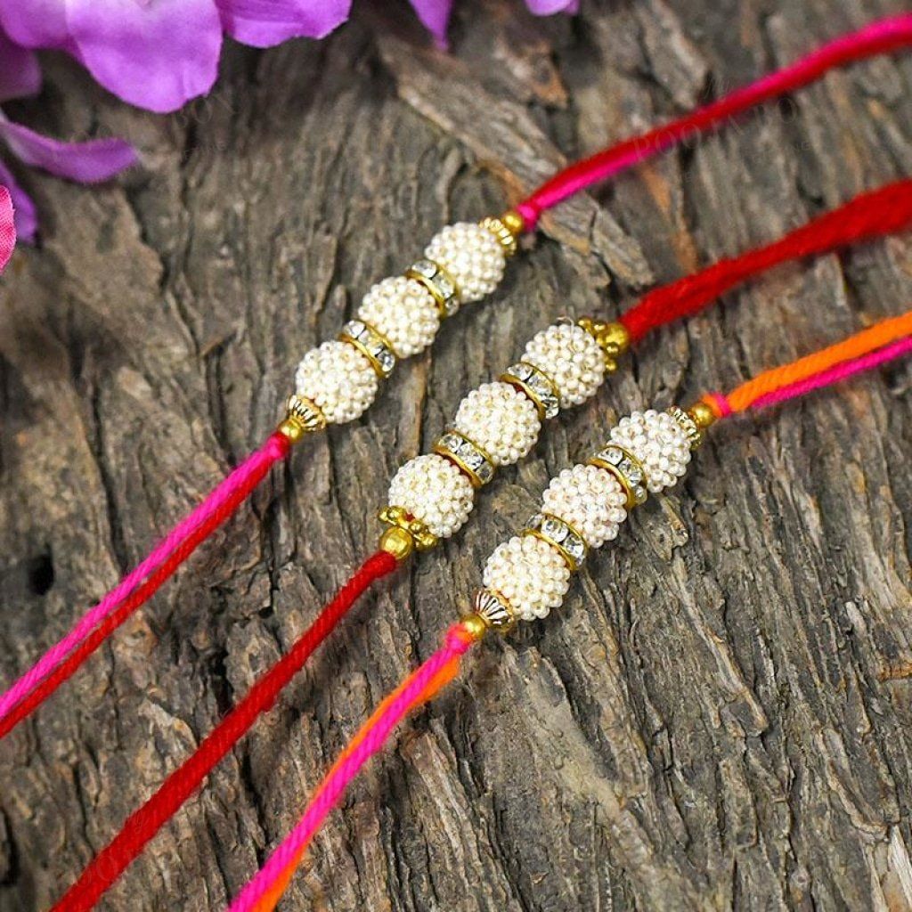 Suave Handcrafted White Beaded Rakhi (Set Of 3)